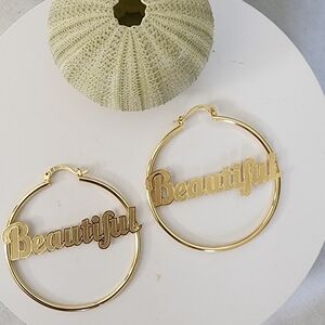 Gold Stainless Steel Hoop Earrings with 'Beautiful' Design